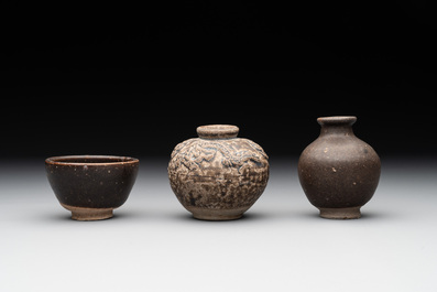 A collection of 11 Chinese and South-East Asian monochrome wares, 15th C. and later
