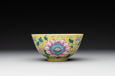 A Chinese famille rose yellow-ground 'peony' bowl, 20th C.