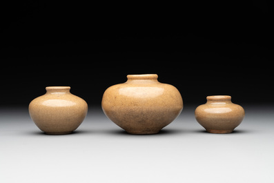 A collection of 11 Chinese and South-East Asian monochrome wares, 15th C. and later