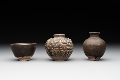 A collection of 11 Chinese and South-East Asian monochrome wares, 15th C. and later