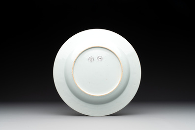 A Chinese famille rose 'lady and boy' plate, Yongzheng/Qianlong