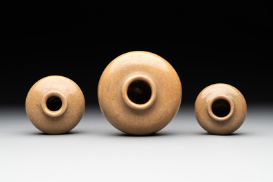 A collection of 11 Chinese and South-East Asian monochrome wares, 15th C. and later