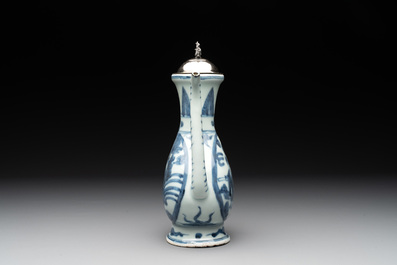 A Chinese silver-mounted blue and white ewer with figures in a landscape, Ming