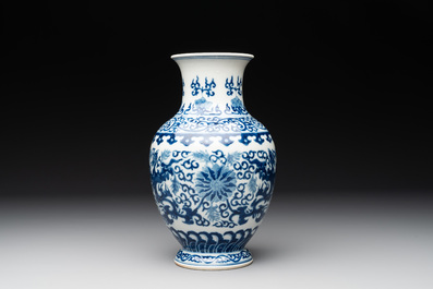 A Chinese blue and white 'phoenix and flower scroll' vase, Qianlong mark, 19th C.