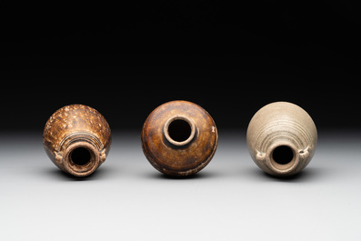 A collection of 11 Chinese and South-East Asian monochrome wares, 15th C. and later