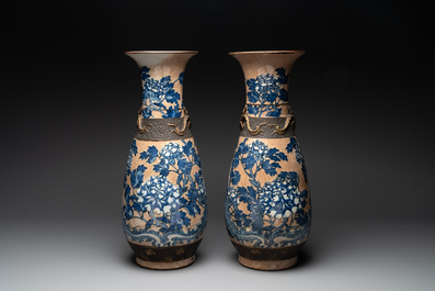 A pair of Chinese Nanking blue and white crackle-glazed 'phoenix' vases, 19th C.