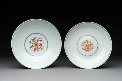 A Chinese famille rose 'dragon and phoenix' bowl and cover, Jiaqing mark and of the period
