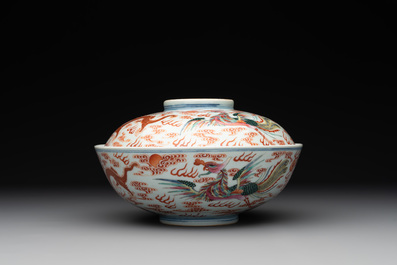 A Chinese famille rose 'dragon and phoenix' bowl and cover, Jiaqing mark and of the period