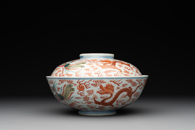 A Chinese famille rose 'dragon and phoenix' bowl and cover, Jiaqing mark and of the period