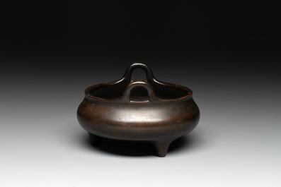 A Chinese bronze tripod censer, Xuande mark, 17/18th C.