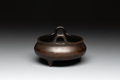 A Chinese bronze tripod censer, Xuande mark, 17/18th C.