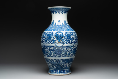 A large Chinese blue and white 'flower scroll' vase, Qianlong mark, 19th C.