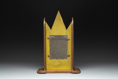 Alfred Daguet (Paris, 1875-1942): A Gothic Revival repouss&eacute; brass and copper-mounted mirror with glass cabochons, signed and dated 1907
