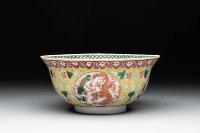 A Chinese famille rose yellow-ground 'dragon and phoenix' bowl, artemisia leaf mark, Guangxu