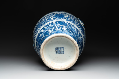 A large Chinese blue and white 'flower scroll' vase, Qianlong mark, 19th C.