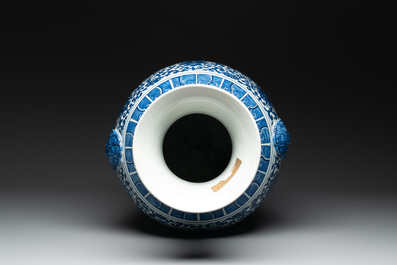 A large Chinese blue and white 'flower scroll' vase, Qianlong mark, 19th C.