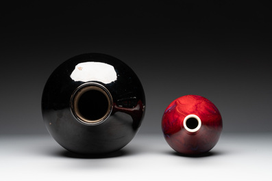 A Chinese black-glazed 'tianqiu ping' vase and a flamb&eacute;-glazed bottle vase, 19/20th C.