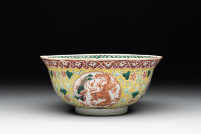 A Chinese famille rose yellow-ground 'dragon and phoenix' bowl, artemisia leaf mark, Guangxu