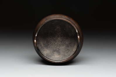A Chinese bronze tripod censer, Xuande mark, 17/18th C.