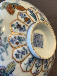 An exceptional Chinese gilt-decorated doucai and famille rose covered bowl with butterflies and floral design, Jiaqing mark and of the period