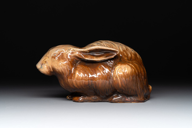 A fine Chinese cafe-au-lait glazed hare on wooden stand, Tian 天 mark, Qing
