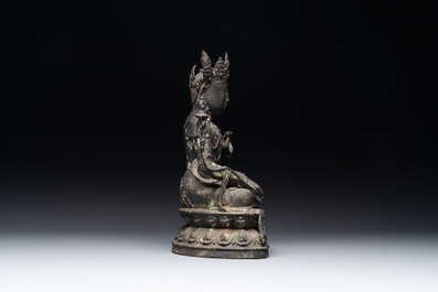 A Chinese bronze seated Bodhisattva on a lotus throne, Ming
