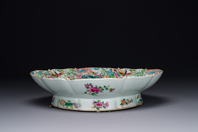 Two Chinese Canton famille rose dishes and a tazza with narrative design, 19th C.