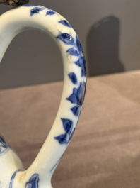 A Chinese silver-mounted blue and white 'Mongolian hunt' ewer, Transitional period