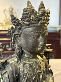 A Chinese bronze seated Bodhisattva on a lotus throne, Ming