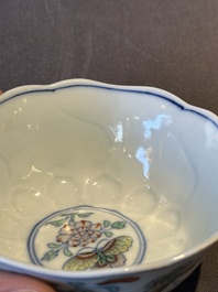 An exceptional Chinese gilt-decorated doucai and famille rose covered bowl with butterflies and floral design, Jiaqing mark and of the period