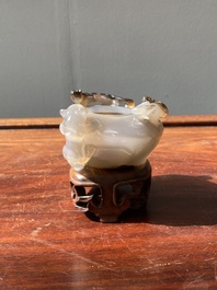 A Chinese agate 'chilong' brush washer and a water pot with Buddhist lions, 19th C.