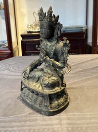 A Chinese bronze seated Bodhisattva on a lotus throne, Ming