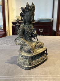 A Chinese bronze seated Bodhisattva on a lotus throne, Ming