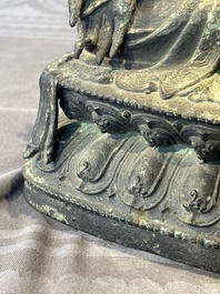 A Chinese bronze seated Bodhisattva on a lotus throne, Ming