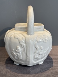 A large Chinese Dehua blanc de Chine wine pot, Kangxi