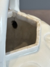 A large Chinese Dehua blanc de Chine wine pot, Kangxi