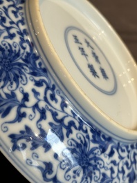 A Chinese blue and white 'flower scroll' plate, Yongzheng mark and of the period