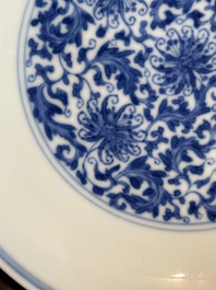 A Chinese blue and white 'flower scroll' plate, Yongzheng mark and of the period