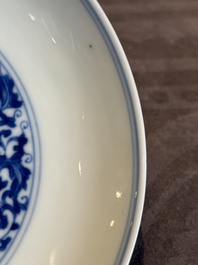 A Chinese blue and white 'flower scroll' plate, Yongzheng mark and of the period