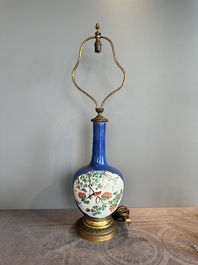 A Chinese famille verte powder blue-ground vase mounted as lamp, 19th C.
