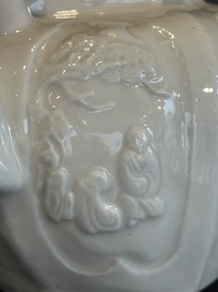 A large Chinese Dehua blanc de Chine wine pot, Kangxi