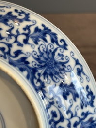 A Chinese blue and white 'flower scroll' plate, Yongzheng mark and of the period
