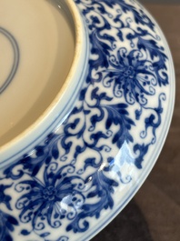 A Chinese blue and white 'flower scroll' plate, Yongzheng mark and of the period