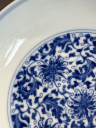 A Chinese blue and white 'flower scroll' plate, Yongzheng mark and of the period