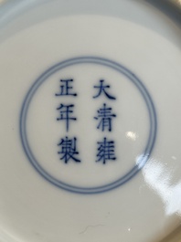 A Chinese blue and white 'flower scroll' plate, Yongzheng mark and of the period