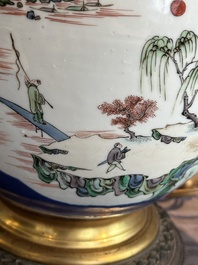 A Chinese famille verte powder blue-ground vase mounted as lamp, 19th C.