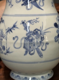 Two Chinese blue and white jugs and cover with floral design, Yongzheng/Qianlong