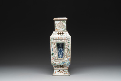 An extremely rare Chinese blue, white and famille verte openworked double-walled vase with figural design, 19th C.