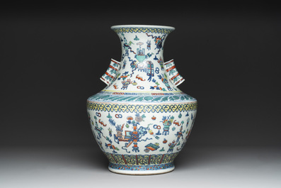 A Chinese doucai 'antiquities' 'hu' vase, Qianlong mark, 19th C.