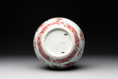 A Chinese copper-red and white 'dragon' bottle vase, 18th C.